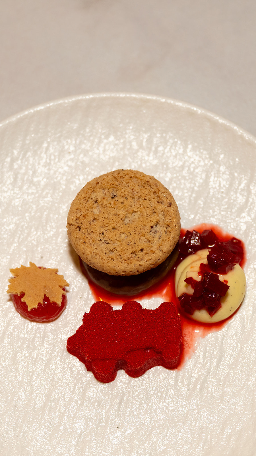 Castanea dish with red elements